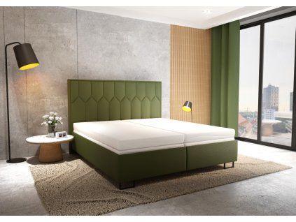 Čalúnená posteľ 180x200 do spálne KORFU Blanář, pohľad šikmo spredu na zelenú posteľ pri okne a nočnej lampe