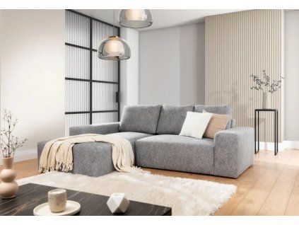 Rohová sedacia súprava ZENITH v sivom poťahu v minimalistickej obývačke, pohľad spredu na prevedenie do L s dekou a vankúšmi.