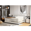 Boxspring posteľ EMBRACE - béžová čalúnená - v modernej spálni - celkový pohľad