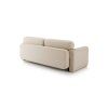 Rozkladacia pohovka MODELA SOFA z bočného uhla, kompaktná silueta v svetlom čalúnení s nízkymi čiernymi nožičkami.
