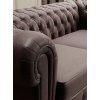 Detail prešívania s gombíkmi na kresle WINDSOR