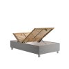 Čalúnená posteľ FIONA Blanář, pohľad na bielom pozadí s vyklopeným roštom a otvoreným úložným priestorom od nôh.