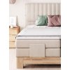 Boxspring posteľ SANDRA - masívne drevo - pohľad spredu - v spálni