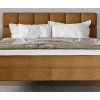 Boxspring posteľ ARES, detail prešívaného čela, vankúšov a lôžka spredu.