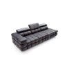 Rovná sedacia súprava DRACO SOFA V8 v tmavosivej farbe, šikmý pohľad zhora s opierkami hlavy nastavenými vyššie a zvýrazneným prešívaním operadla.