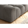Rozkladacia sedacia súprava ZEN sofa svetlosivá, detail zaobleného bočného zakončenia a švov poťahu na drevenej podlahe.
